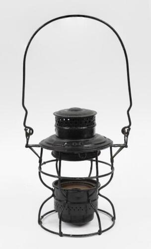 LAMP: A black 1922 wire framed, multipurpose lamp, 41cm high.