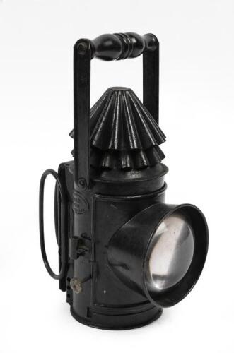 LAMP: A black 'Freeman Thomas & Co M&C 1901' lantern, with rotating lens, 24.5cm high