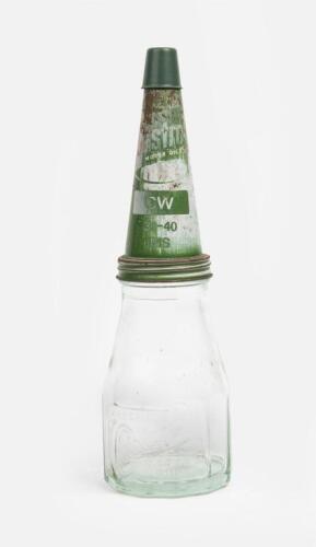 CASTROL: A one pint embossed glass Wakefield motor oil bottle with a later metal pourer and associated dust cap.