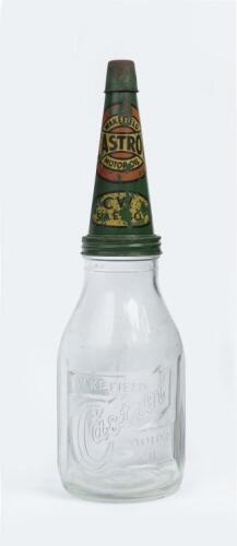 CASTROL: An embossed one imperial quart Castrol Wakefield glass oil bottle with early Castrol 'CW S.A.E. 30' tin pourer with dust cap