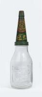 CASTROL: An embossed one imperial quart Castrol&nbsp;Wakefield glass oil bottle with early Castrol&nbsp;'CW S.A.E. 30'&nbsp;tin pourer with dust cap