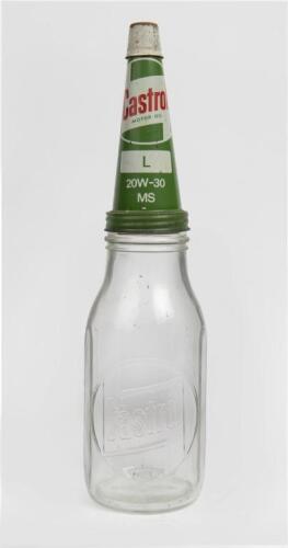 CASTROL: A one quart embossed Castrol hockey stick logo glass oil bottle with Castrol '20W-30 MS', tin pourer, with dust cap