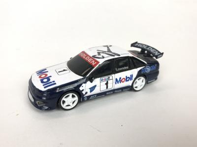 CRAIG LOWNDES: A 1:43 scale Holden Commodore VR signed by Craig Lowndes