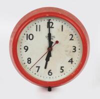 CLOCK: A red 'Smiths&nbsp;Sectric' clock.