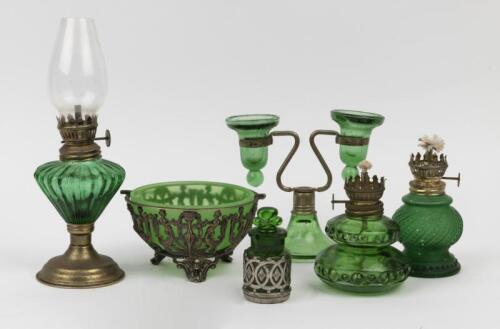 GREEN GLASS: A collection of green glass, including oil lamps