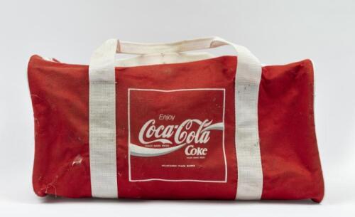 COCA COLA: A vintage Coca Cola duffle bag, some dirt and sun damage.