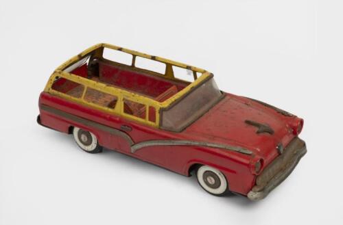 FORD STATION WAGON TIN PLATE: A friction powered tin toy car in form of a Ford station wagon, maker TN toys Japan