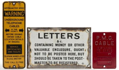 SIGNS: A collection of three signs including an enamel 'Warning Underground Telephone Cables' sign, a cast 'P.M.G Cable' sign and an enamel 'Letters' post office sign, largest 30cm tall