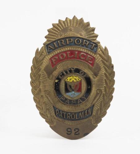 BADGE: An interesting original 'City of Pasay' Philippines airport police patrolman badge, numbered '92'