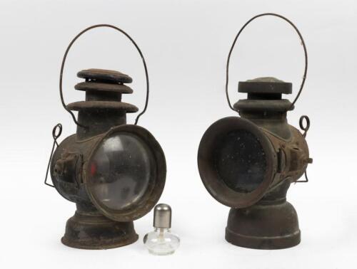 LAMPS: Two early lamps including 'Dietz' union driving lamp and one other unmarked, both approximately 38cm tall