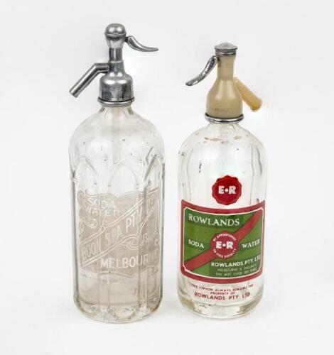 SYPHONS: Two vintage glass soda syphons including 'Rowlands Soda Water' and 'Boon Spa Pty Ltd Soda Water'.