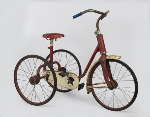 CHILDREN'S TRICYCLE: A vintage red painted children's tricycle