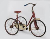 CHILDREN'S TRICYCLE: A vintage red painted children's tricycle