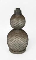 SYPHON: A 'Veritable Seltzogene D. Fevre, Paris' heavy glass&nbsp;double bulb soda syphon&nbsp;with metal mesh wire around body no metal tap, approximately 40cm high, 19cm wide&nbsp;