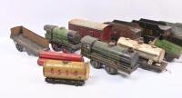 MODEL RAILWAY: A collection of three clockwork tinplate locomotives and assorted tenders and wagons. - 2