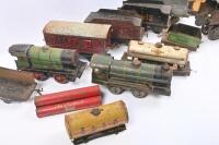 MODEL RAILWAY: A collection of three clockwork tinplate locomotives and assorted tenders and wagons. - 3