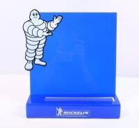 MICHELIN: A collection of three&nbsp;'Michelin Man' books and a 'Michelin Tyre Centre' design advertising stand. - 2