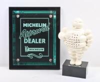 MICHELIN: A 'Michelin Approved Dealer' wall plaque and a Michelin Bibendum figure speaker