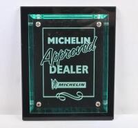 MICHELIN: A 'Michelin Approved Dealer' wall plaque and a Michelin Bibendum figure speaker - 2