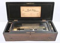 MUSIC BOX: An antique Swiss made music box by 'F Cochon Fabricant&nbsp;Geneva', brass tubular design, box with inlay design to lid. 54cm wide, 14cm high, 22cm deep.