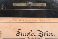 MUSIC BOX: An antique Swiss made music box by 'F Cochon Fabricant&nbsp;Geneva', brass tubular design, box with inlay design to lid. 54cm wide, 14cm high, 22cm deep. - 3