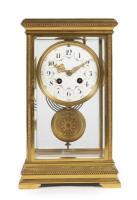CLOCK: A&nbsp;fine&nbsp;late 19th century French 4-glass bronze mantle clock with enamelled face and&nbsp;'Japy Freres' movement, with key, 30.5cm high, 18.5cm wide, in working order.