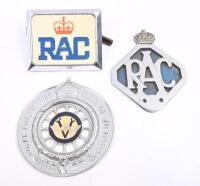 RAC: A collection of three RAC badges including early Royal Automobile Club of Victoria round grille badge, and two later RAC badges. Largest measures 10cm wide.