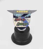 BROOKALNDS: An original B.R.D.C Brooklands enamelled membership grill badge by Spencer London and numbered &lsquo;978&rsquo;, Bakelite base