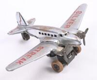 SILVER STREAK WIND UP PLANE: A pressed metal, wind up vintage toy plane, has silver streak across the wings, possibly Japanese made, has key but not original, approx 13cm in length&nbsp;