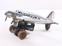 SILVER STREAK WIND UP PLANE: A pressed metal, wind up vintage toy plane, has silver streak across the wings, possibly Japanese made, has key but not original, approx 13cm in length&nbsp; - 2