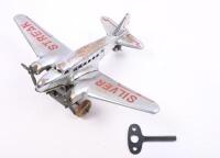 SILVER STREAK WIND UP PLANE: A pressed metal, wind up vintage toy plane, has silver streak across the wings, possibly Japanese made, has key but not original, approx 13cm in length&nbsp; - 5