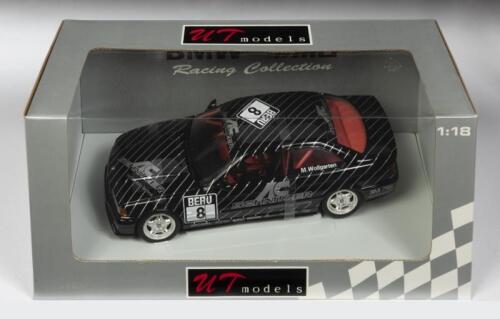 BMW M3: A 1:18 scale BMW M3 model, finished in the number #8 M.Wollgarten race livery