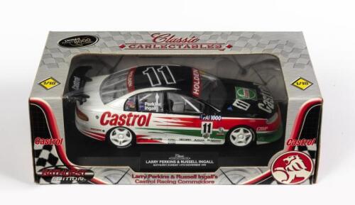 HOLDEN COMMODORE: A 1:18 scale Holden VT Commodore model, the number #11 Larry Perkins - Russell Ingall finished in the Castrol livery from Bathurst 1999