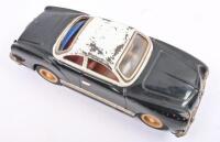 KARMANN GHIA: A circa 1960s Japanese tin toy Volkswagen Karmann Ghia in black with white roof, 24cm long - 2