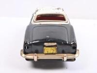 KARMANN GHIA: A circa 1960s Japanese tin toy Volkswagen Karmann Ghia in black with white roof, 24cm long - 5