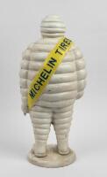MICHELIN: A heavy cast iron reproduction standing Michelin Bibendum figure, 55cm high - 2