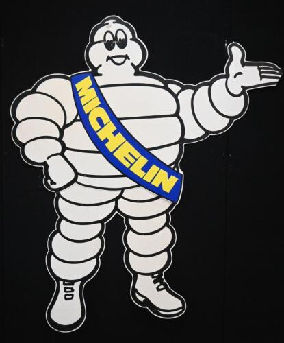 MICHELIN: A c1970s large original Michelin standing Bibendum figure, left facing 164 cm high.