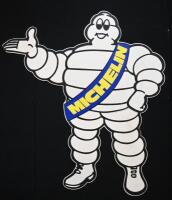 MICHELIN: A c1970s large original Michelin standing Bibendum figure, right facing 164cm high.