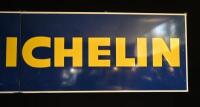 MICHELIN: A large original 1977 two piece Michelin Tyres enamel sign, 294cm wide overall - 12