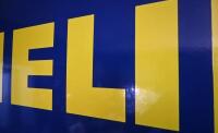 MICHELIN: A large original 1977 two piece Michelin Tyres enamel sign, 294cm wide overall - 14