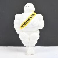 MICHELIN: A modern seated Michelin Bibendum figure, plastic with metal bracket, approx 22cm tall.&nbsp;