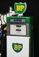 BP: A restored c1960s-1970s Wayne model 605 petrol bowser in BP livery, plastic BP shield logo globe affixed to top. Approx 184cm high - 17