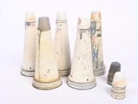 TIN TOPS: A collection of five Mobil tin top oil pourers each with dustcaps, along with a selection of 12 tin dust caps, white and gold for Mobil tops.&nbsp;