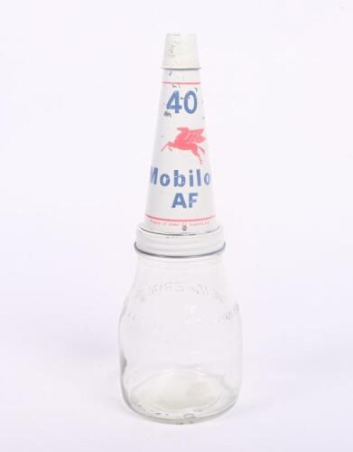 MOBIL: A Mobiloil original one pint glass oil bottle with fitted '40 AF' grade tin top pourer with dust cap