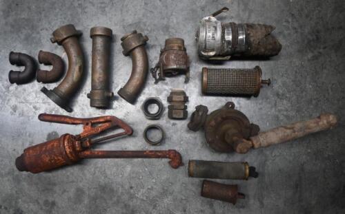 PUMP PARTS: A tub full of various pump/tap parts including Gilbarco highboy oil pump top, and others