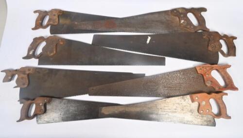 SAWS: A collection of eight vintage hand saws, some marked with branding including Disston.