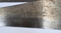 SAWS: A collection of eight vintage hand saws, some marked with branding including Disston. - 2