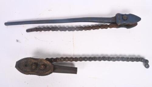PIPE WRENCHES: Two vintage pipe Wrenches for large pipes, including Record No.233 for 3/4 to 4" pipe with chain, along with blue Vulcan No.12 Wrench also with chain.