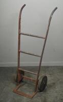 TROLLEY: A vintage red metal hand trolley, approx 100cm tall.