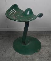 SEAT: A vintage tractor seat mounted to circular cast base, approx 60cm tall, seat unmarked. - 4